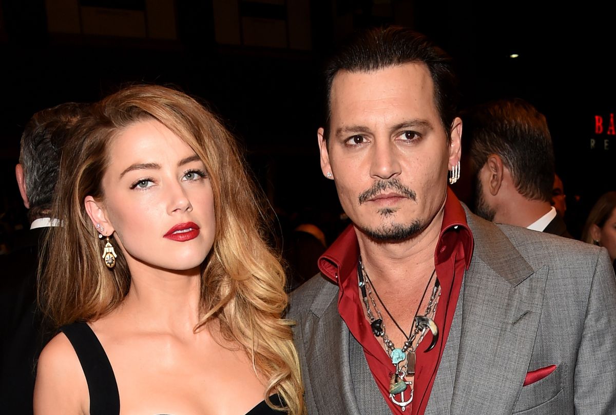 Amber Heard and Johnny Depp at "Black Mass" premiere, 2015 (Jason Merritt/Getty Images)